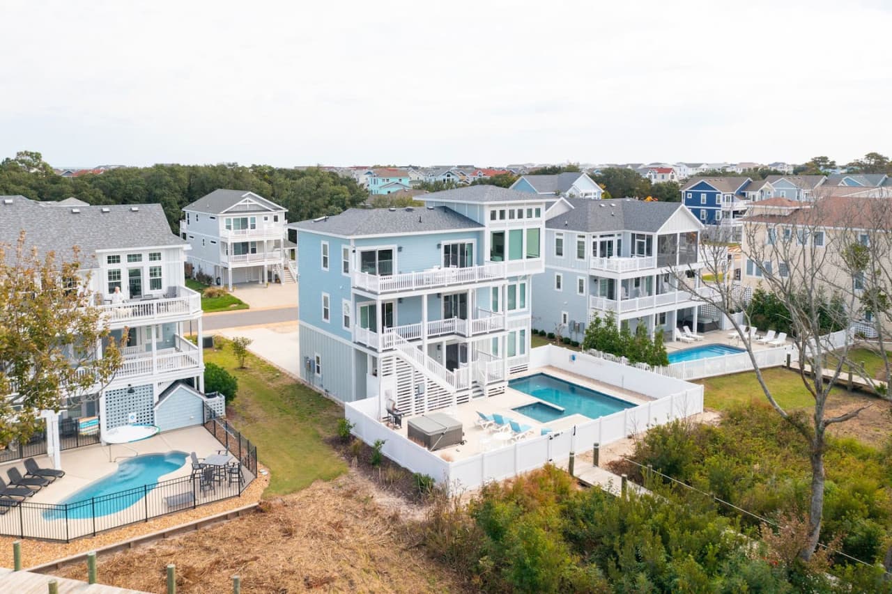 Stylish exterior showcasing the home’s clean lines & coastal-inspired design.