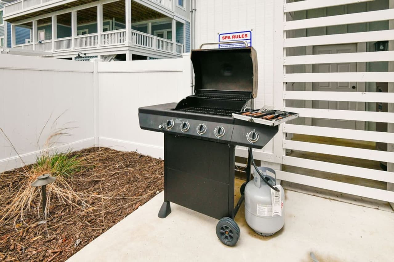 Outdoor grill setup ready for casual cookouts & relaxed meals at home.