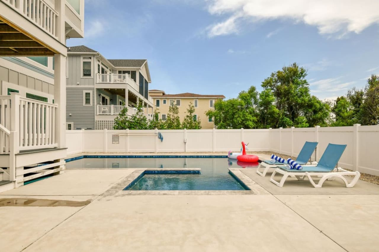 Private pool area w/ loungers & floats, made for sunny afternoons & downtime.