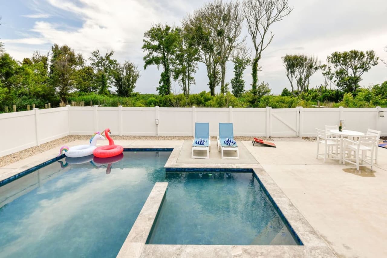 Private pool area w/ loungers, floats & space to soak up the sun.