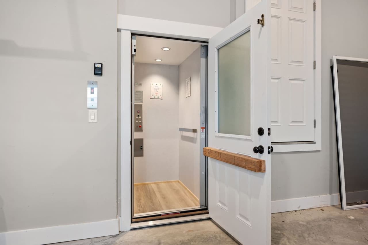 Private elevator serving the garage & all three floors for easy loading in.