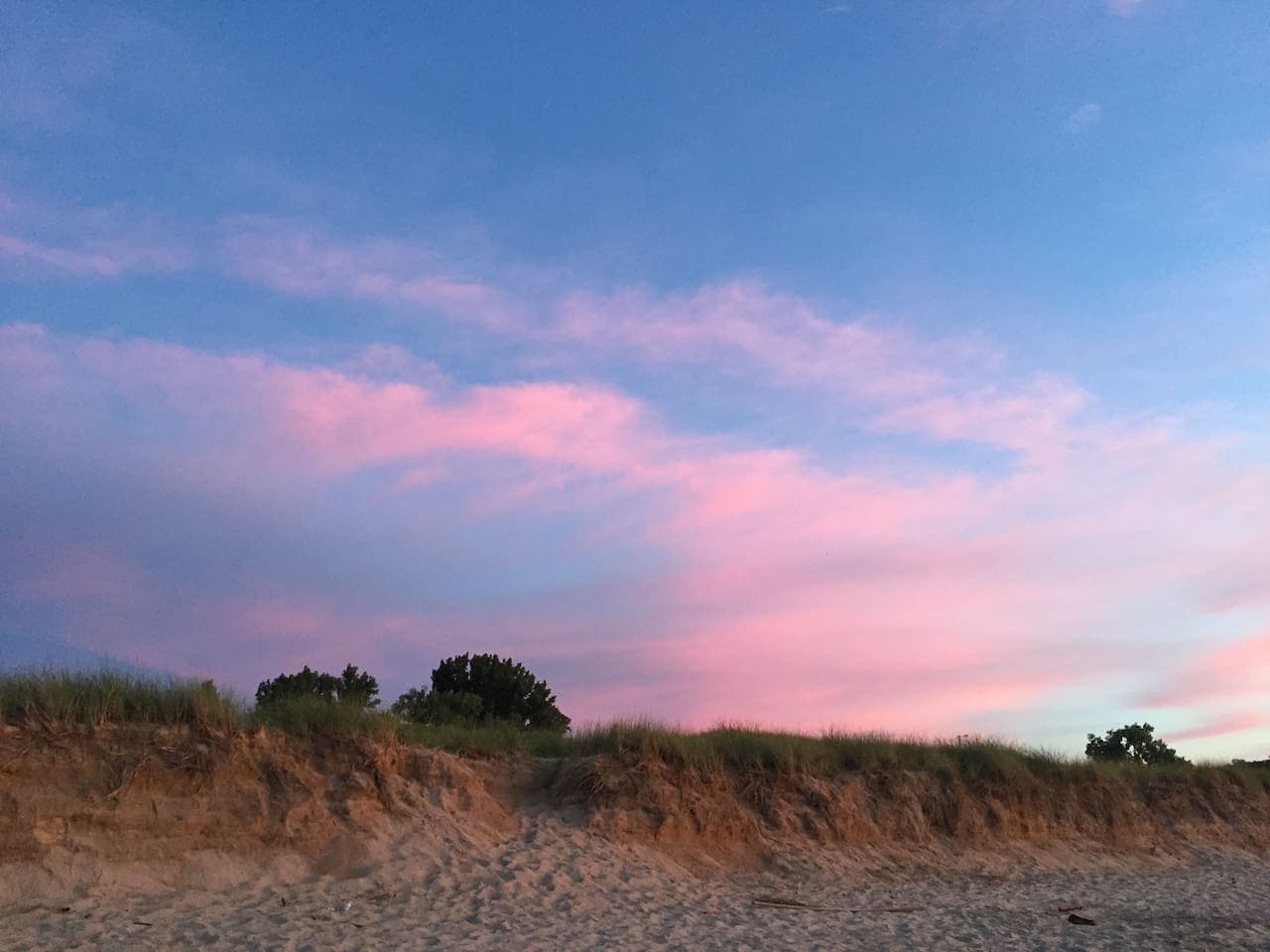 Enjoy breathtaking sunset views with direct access to the beach
