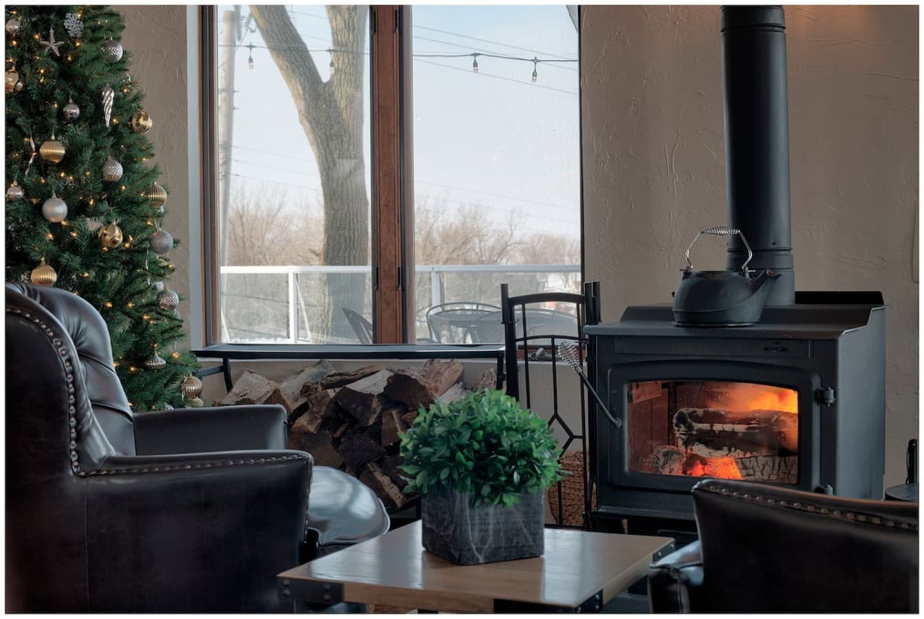 Enjoy the wood burning stove in the spacious Round Room.