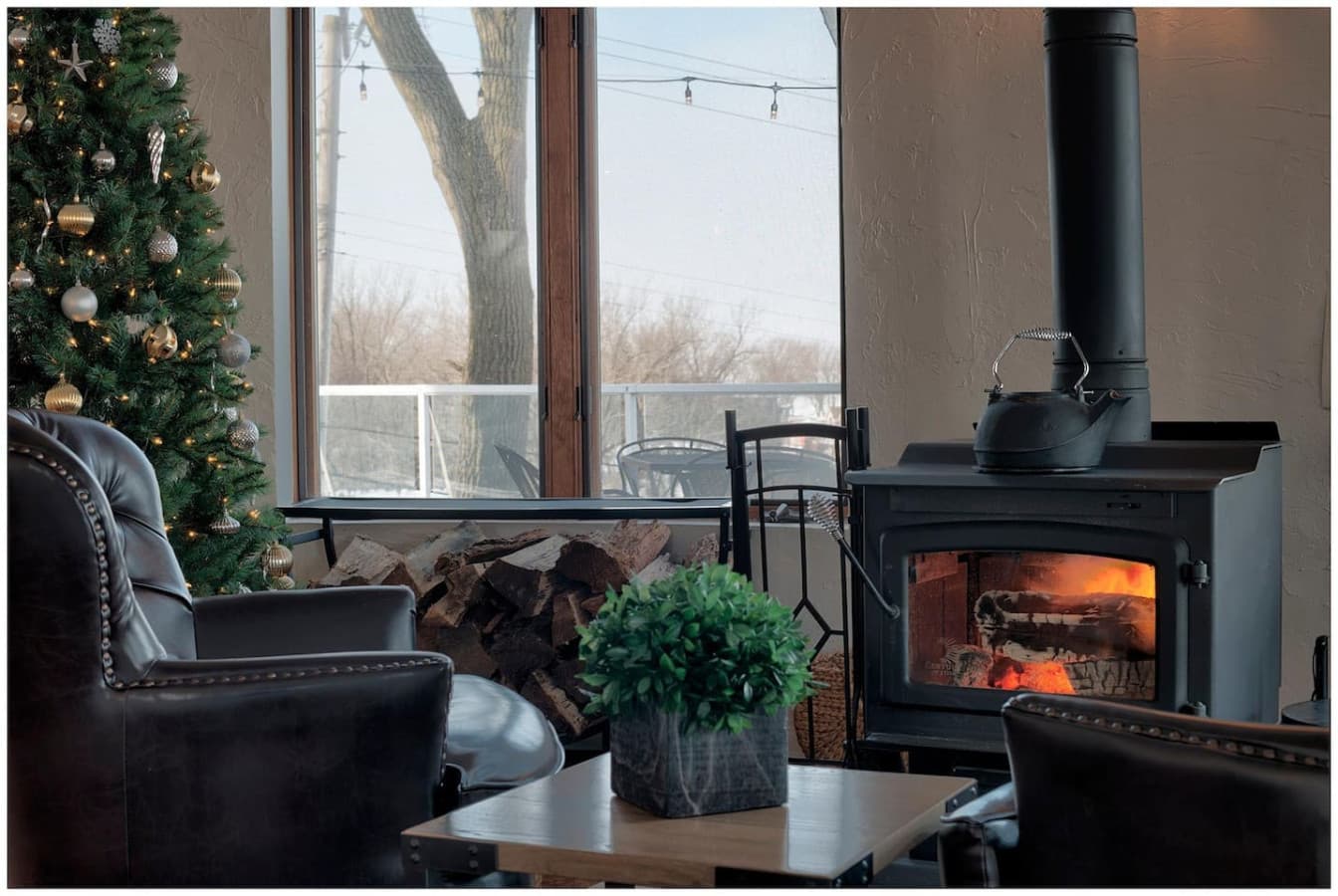 Enjoy the wood burning stove in the spacious Round Room.