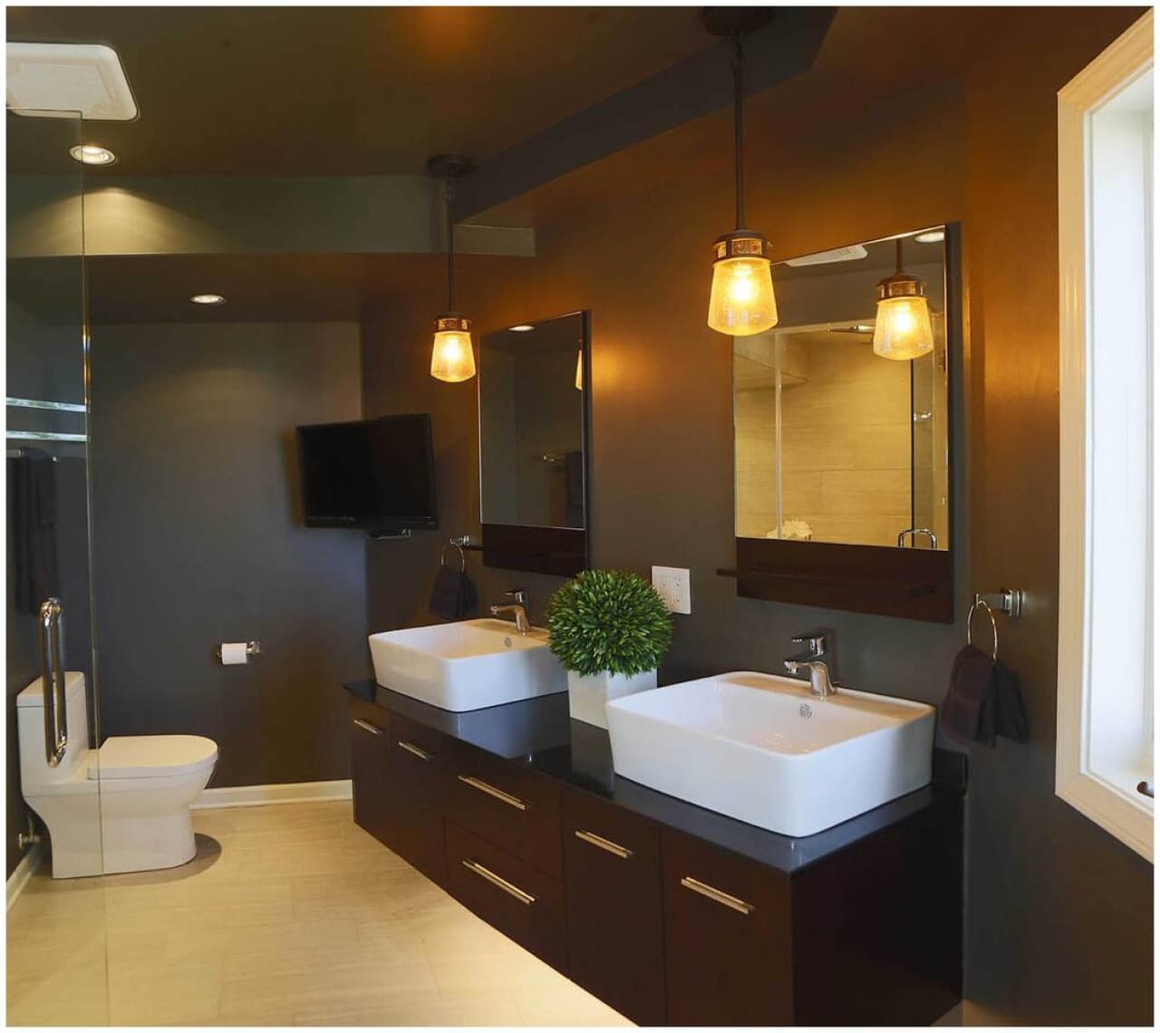 The Master Bathroom features heated stone floors and towel bars, a floating vanity, and Smart TV.
