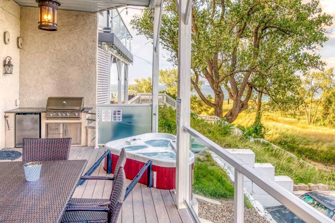 Relax in the Addition's 3-person hot tub with LED lights and waterfall.