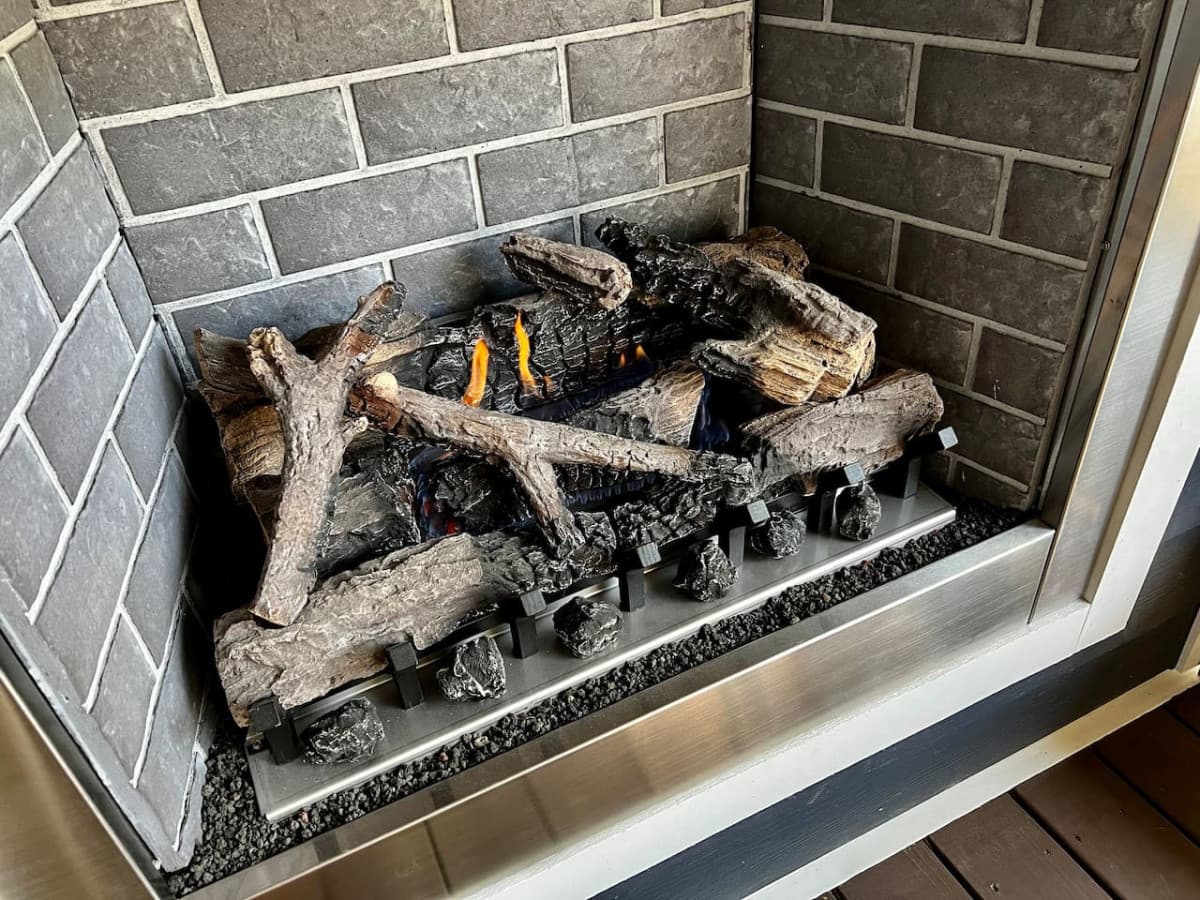 Take the chill off the evening with the gas fireplace on the back porch.
