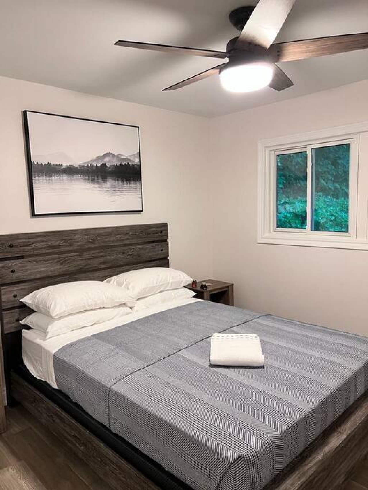 Bedroom with queen bed.