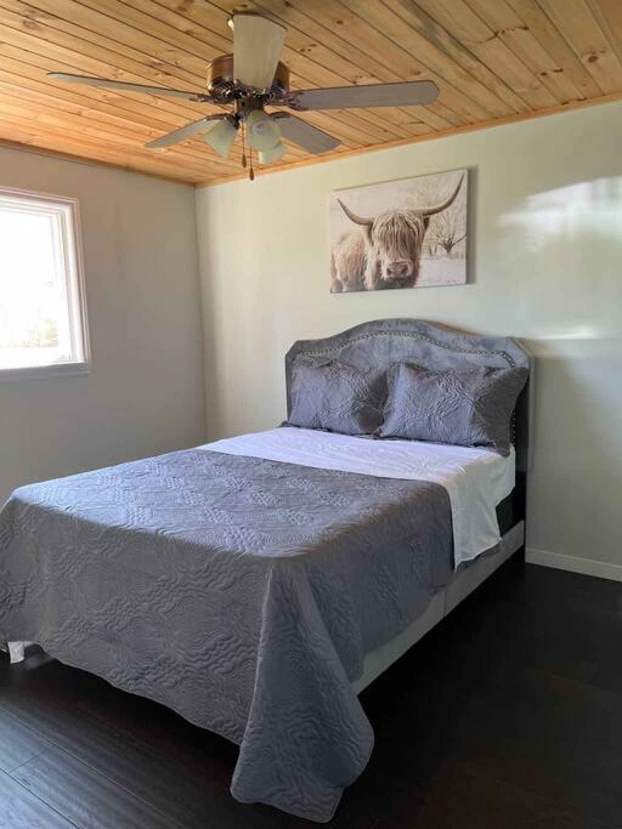 Spacious master bedroom with beautiful views of the open fields.