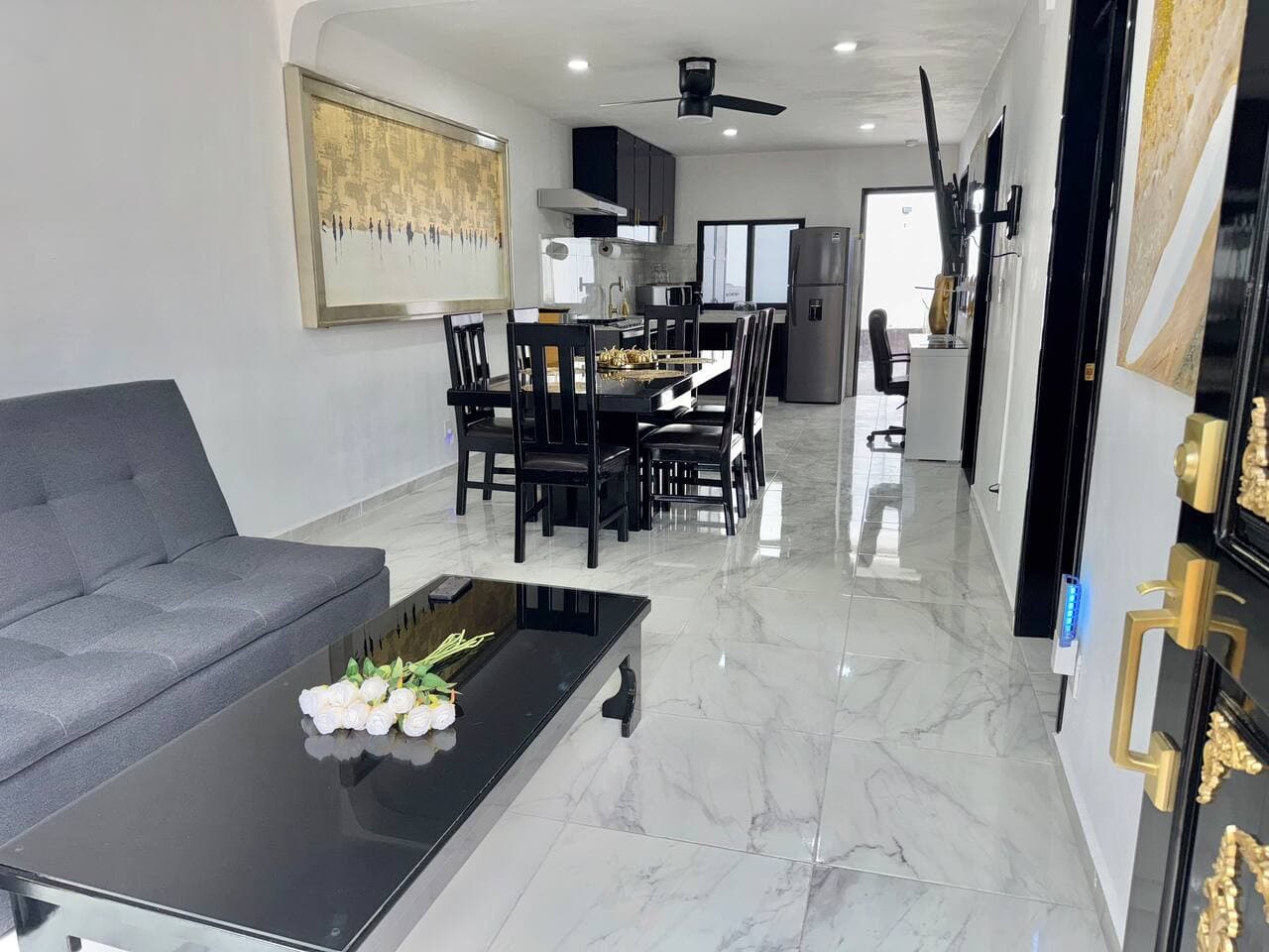 Exquisite Mable Floors & Gold Touches Throughout
