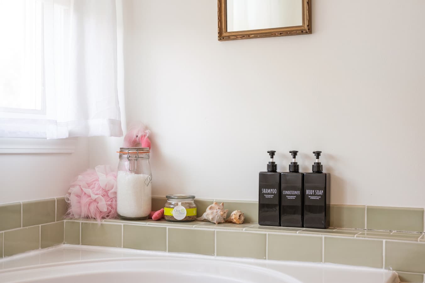 Kitchen counter detail w/ neatly arranged essentials, adding a simple, homey touch.