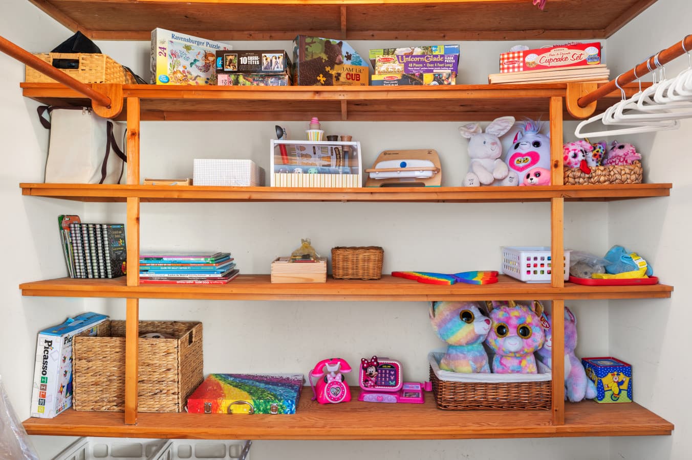 Shelves stocked w/ board games, puzzles, books & toys for rainy-day entertainment.