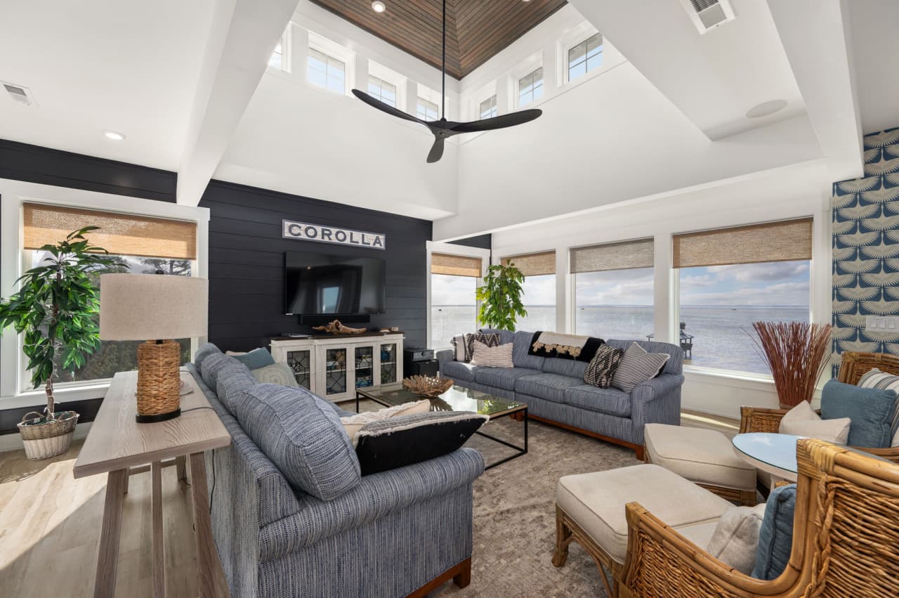Inviting living area w/ plush sofas, textured accents & an open layout for easy gathering.