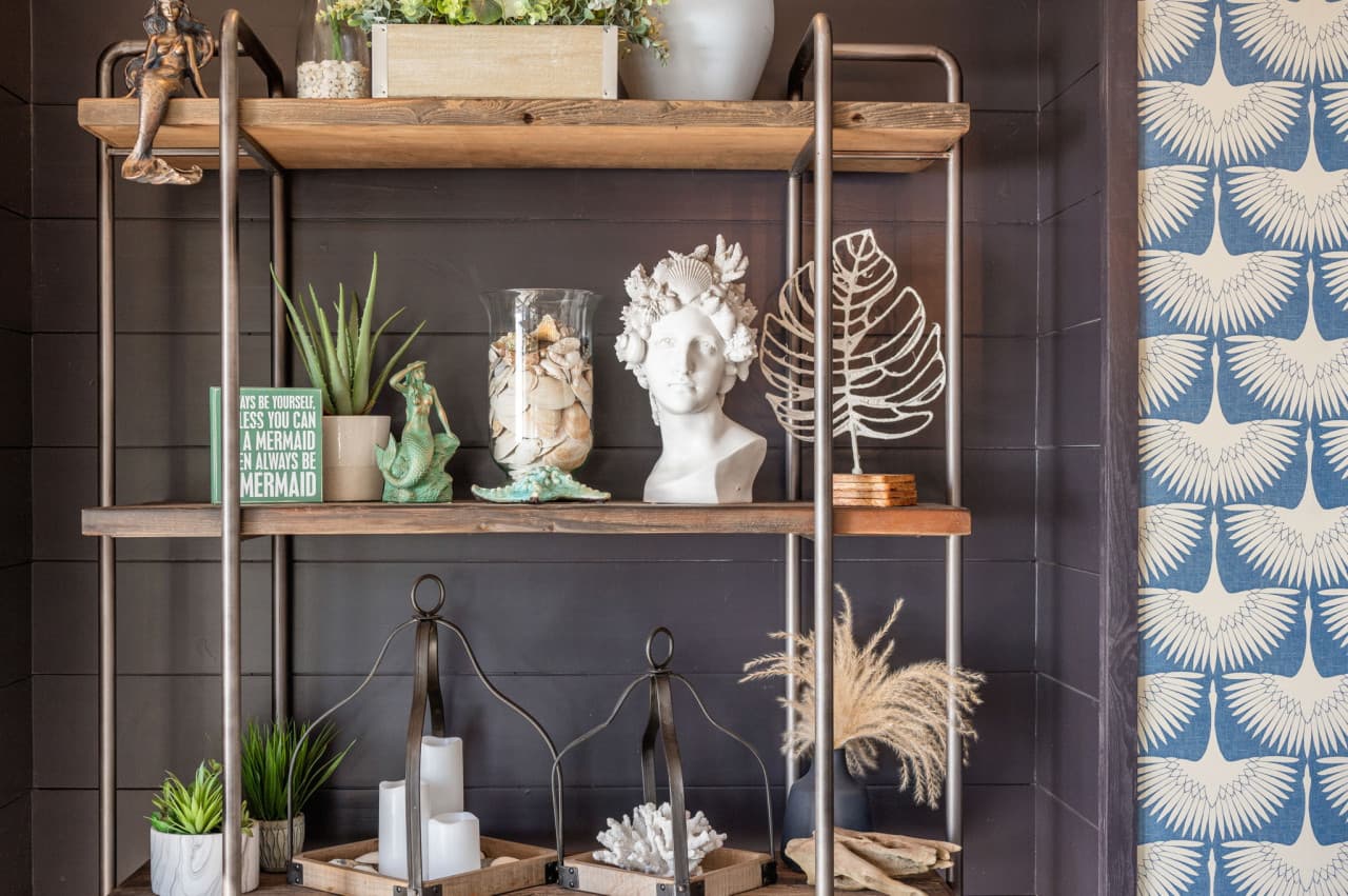 Styled shelves w/ coastal décor & natural textures that add character and charm.