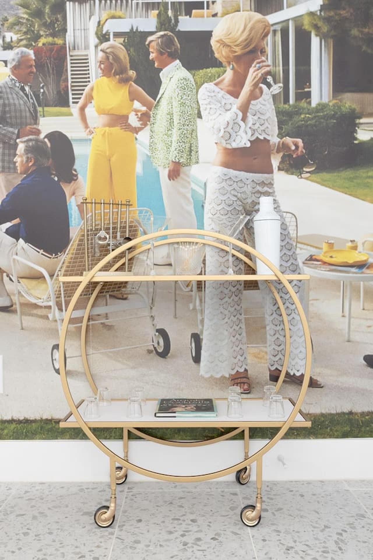 Toast to the Palm Springs lifestyle with a cocktail from our handy bar cart, all while enjoying the charm of our local-inspired mural