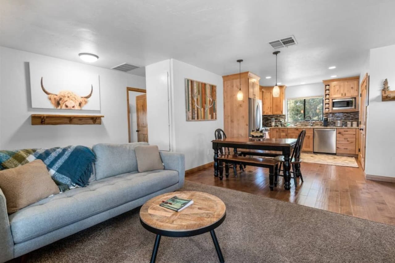 Clean and tidy living room, cuddle up by the fireplace with a book or a board game- Rather Be Properties
