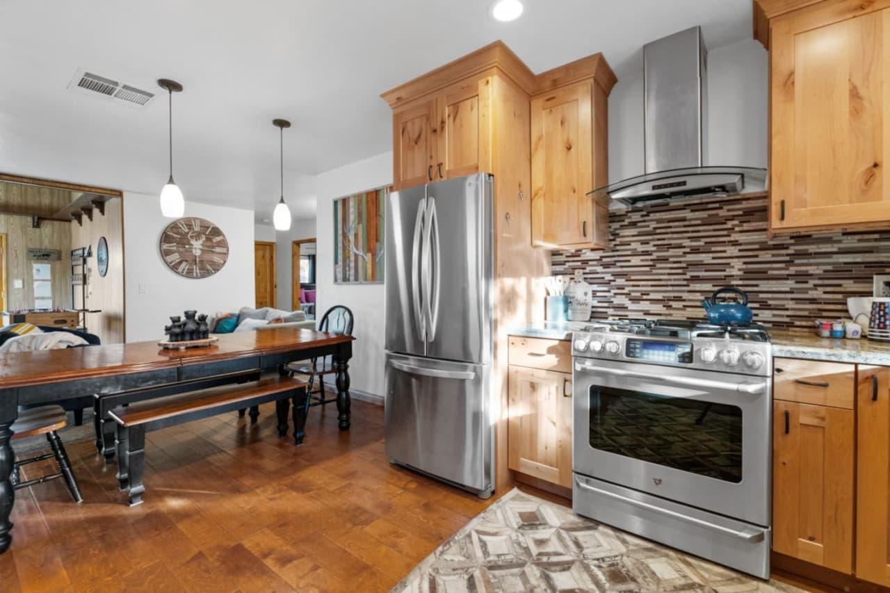 Your cooking sanctuary awaits! Experience luxury in this well-equipped kitchen adorned with inviting wood touches