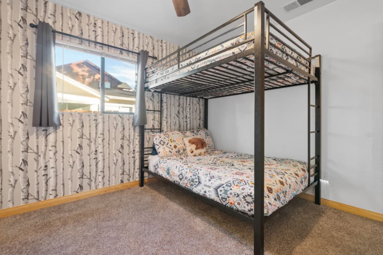Rest Serenely in a Bunked Bed, Surrounded by Thoughtful Decor and Polite, Friendly Ambiance.
