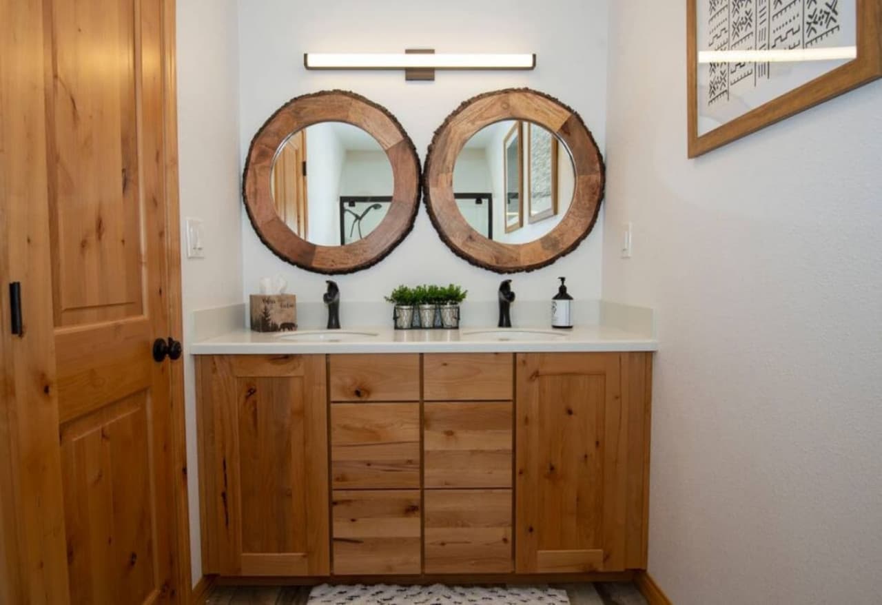 Second bathroom a bath- shower combo, equip with towels, shampoo, conditioner, body wash, hand soap, hair dryers and ample toilet paper -Rather Be Properties