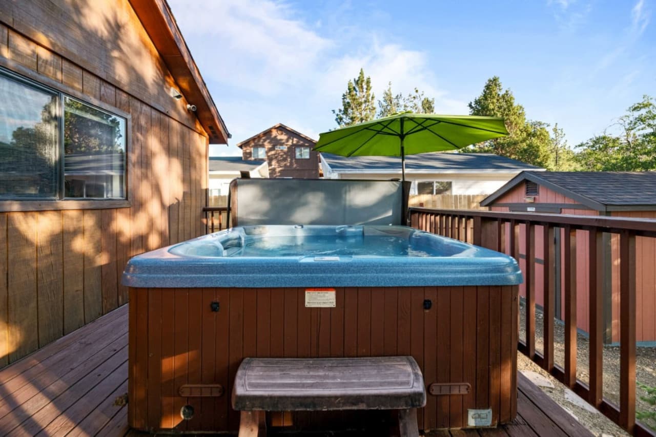 Relax & rejuvenate in our serene getaway with a private outdoor hot tub, perfect for unwinding under the stars