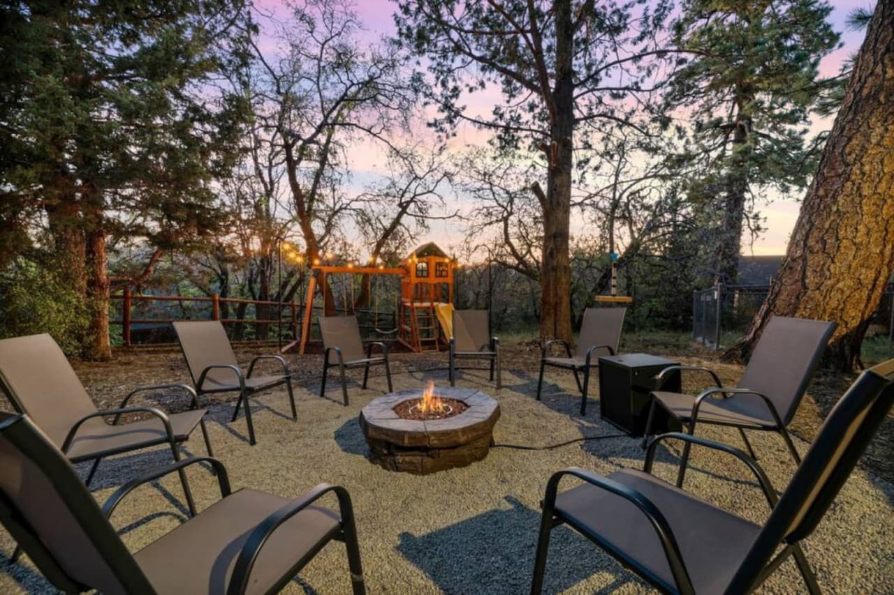 Experience the magic of togetherness by the firelight. Our snug fire pit sets the scene for cherished moments.