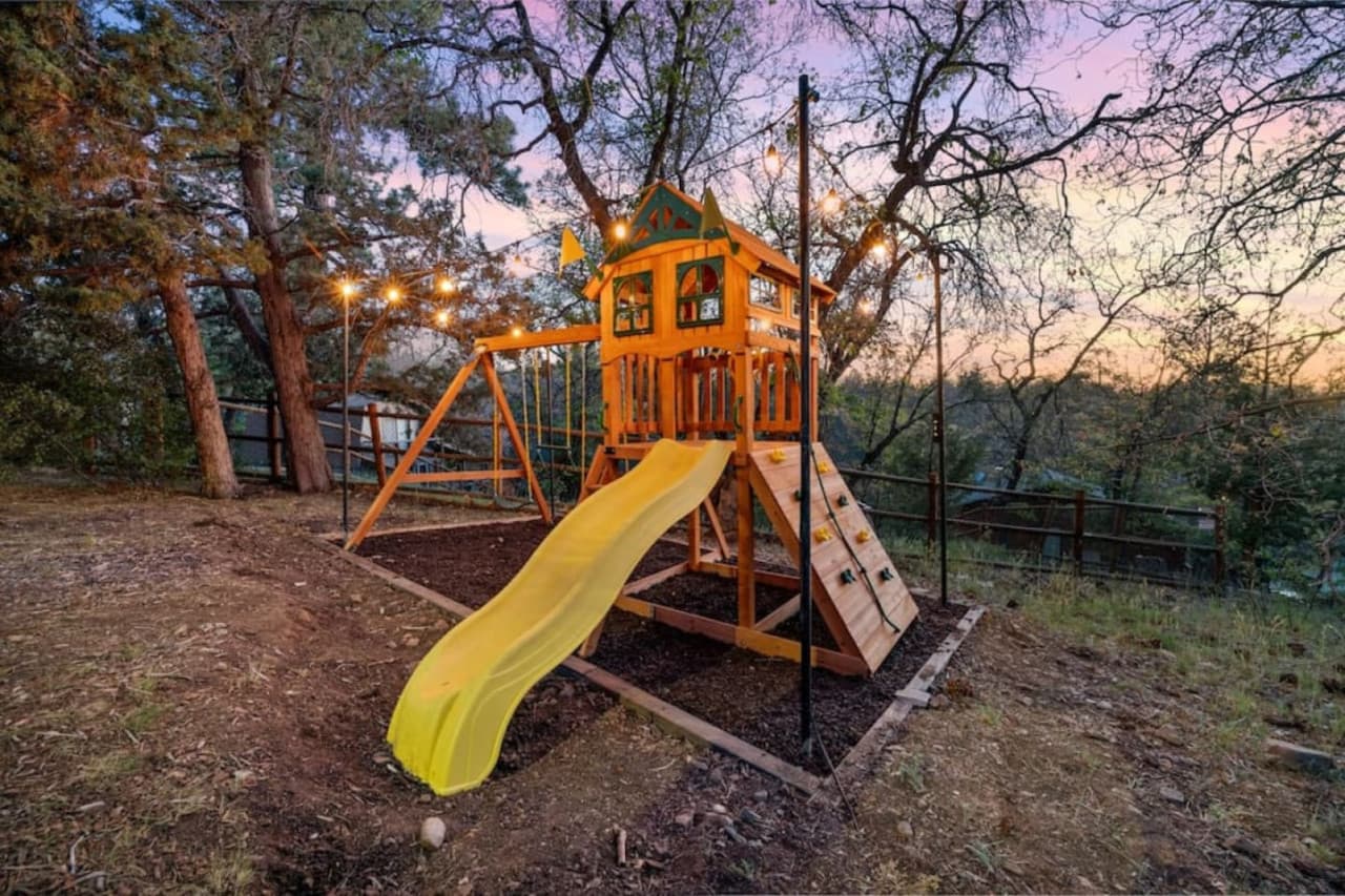 During summer let your kids get all their wiggles out with our brand new 13ft x 15 ft children's playground which includes an alpine wave slide, rock wall with climbing rope, safe entry ladder, 2 belt swings, trapeze swing, steering wheel, and telescope p