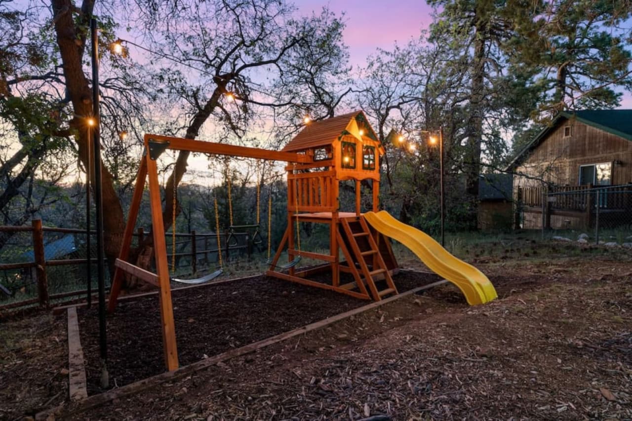 During summer let your kids get all their wiggles out with our brand new 13ft x 15 ft children's playground which includes an alpine wave slide, rock wall with climbing rope, safe entry ladder, 2 belt swings, trapeze swing, steering wheel, and telescope p