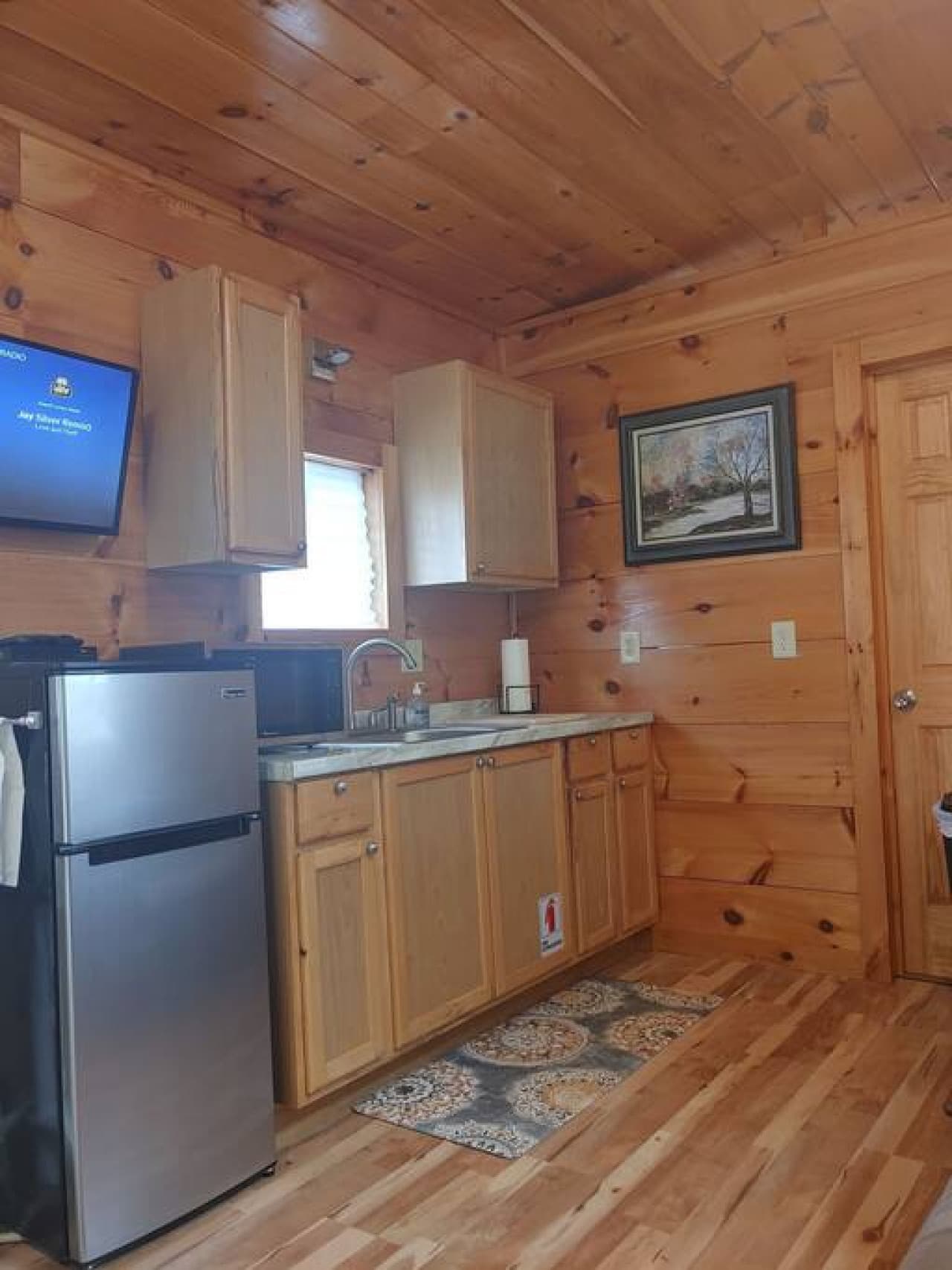 Non cook kitchen offers microwave, refrigerator and freezer. Outdoor grill for BBQ is included