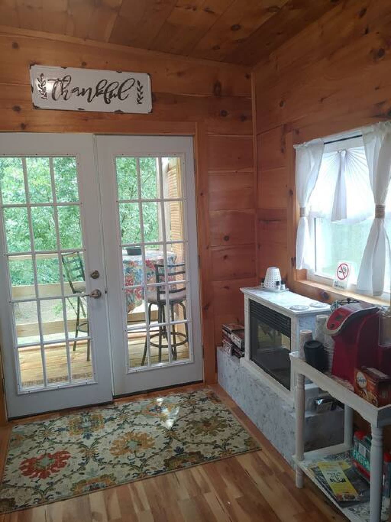 Lots of natural light with french windowed doors and 6 additional windows in main living area.