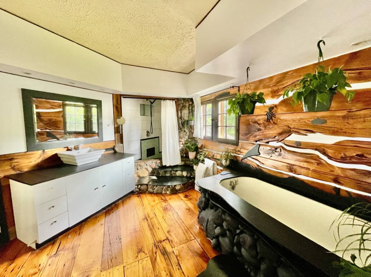 Main bathroom with shower and bath.