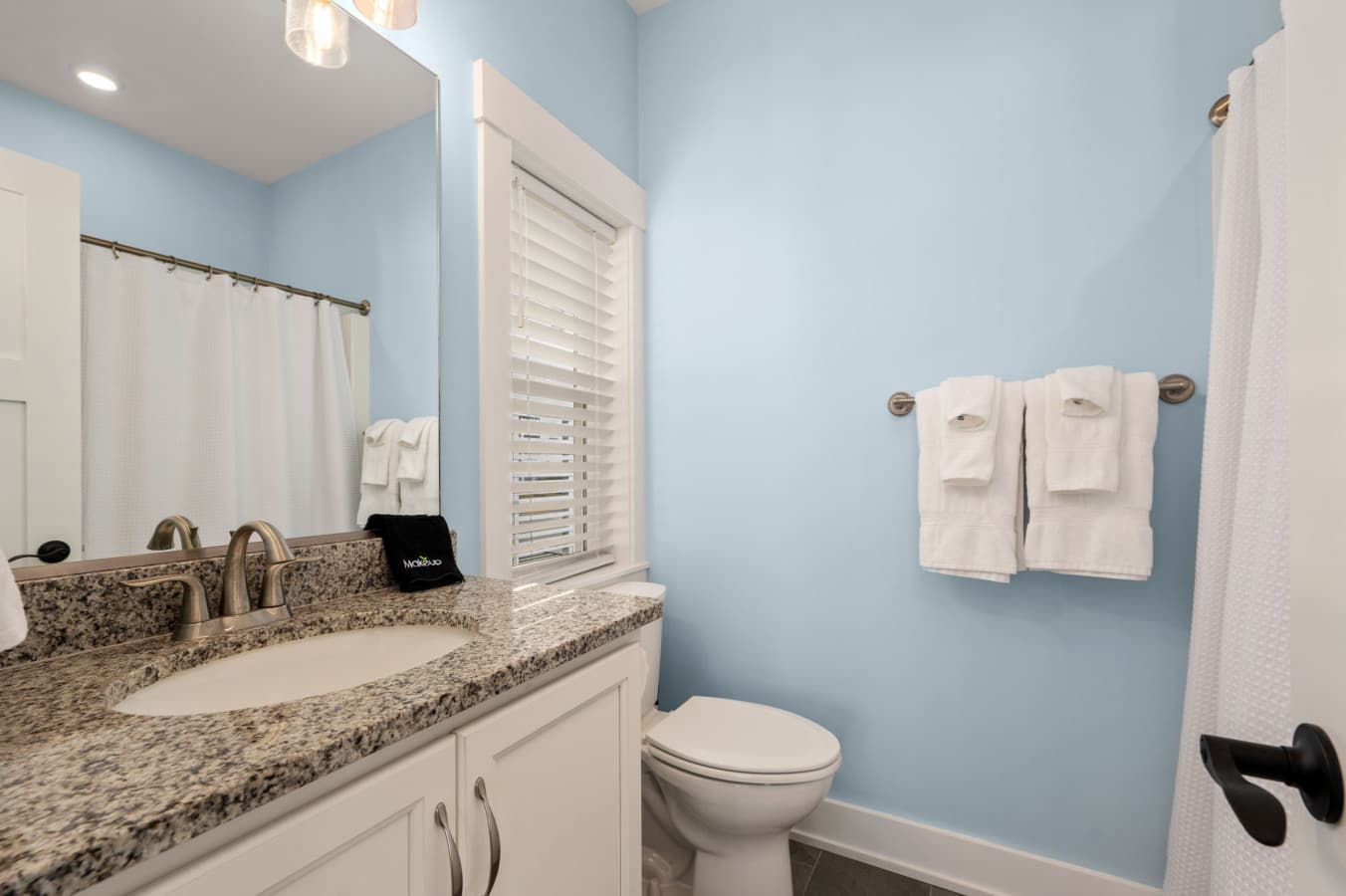 Full bath w/ granite vanity, tub-shower & fresh towels stocked on the rack