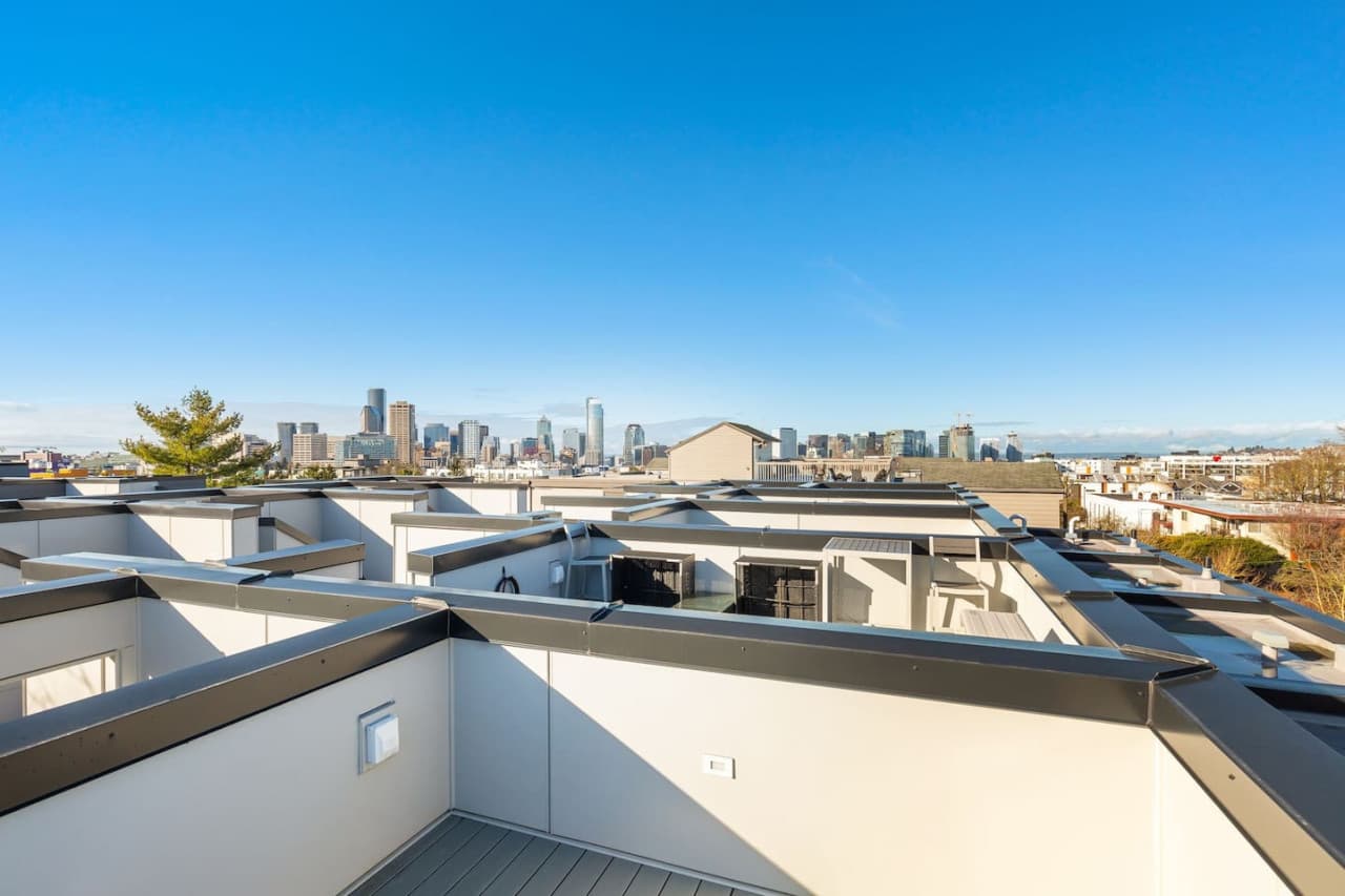 Step outside to your own private rooftop oasis, where breathtaking views of downtown Seattle await. Whether you're soaking up the sun or stargazing in the evening, this rooftop deck is the perfect place to unwind and take in the sights.