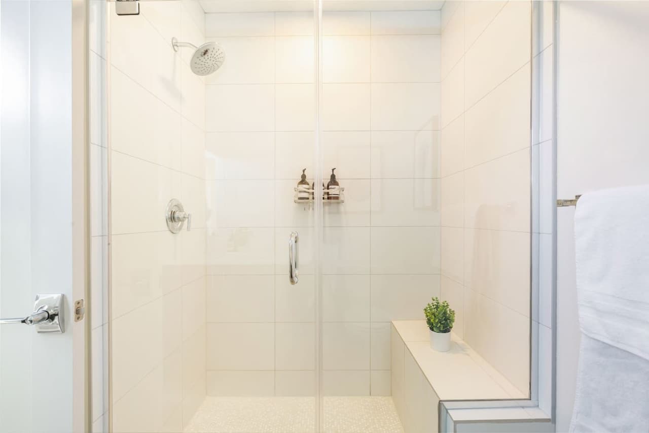 Enjoy added convenience with a three-quarter bathroom, providing additional amenities such as shampoo, conditioner, and body soap, along with soft towels.