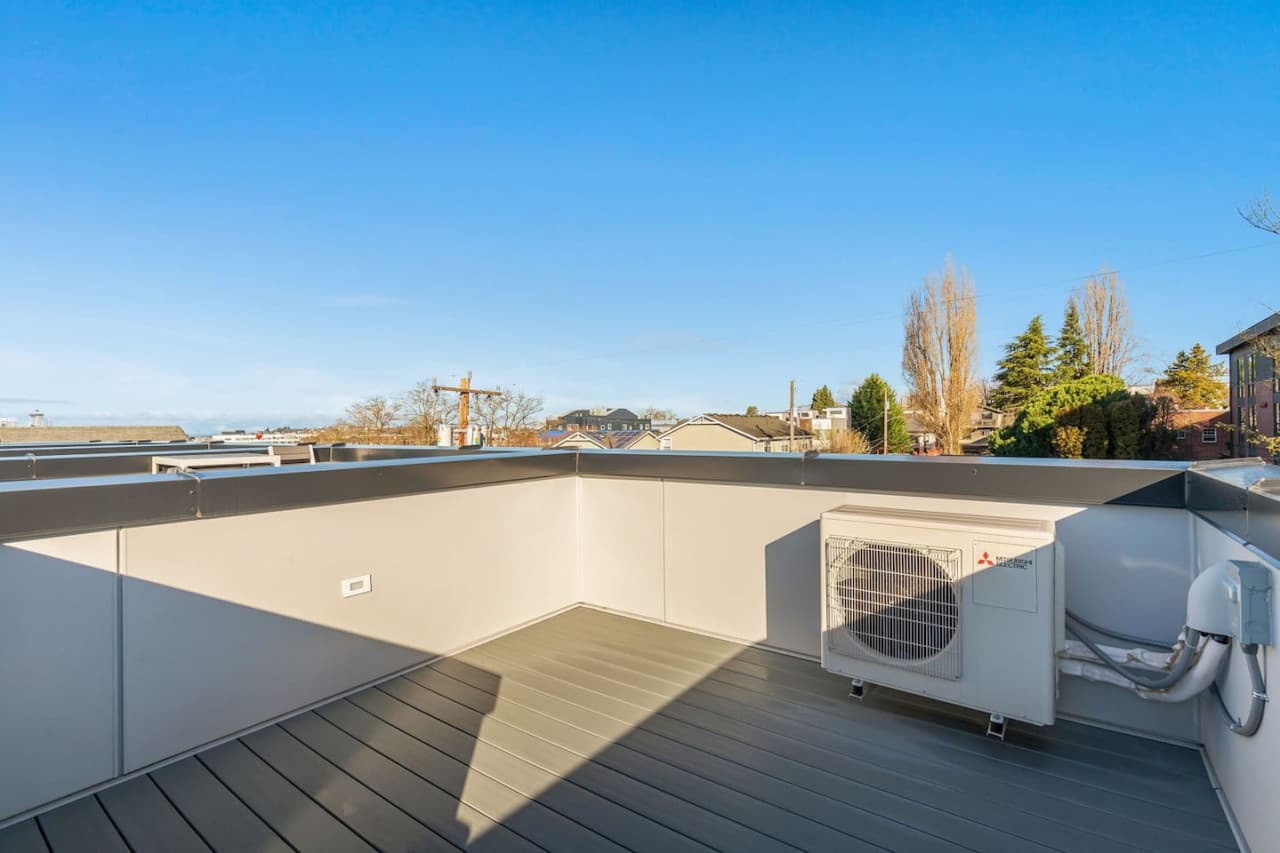 Step outside to your own private rooftop oasis, where breathtaking views of downtown Seattle await. Whether you're soaking up the sun or stargazing in the evening, this rooftop deck is the perfect place to unwind and take in the sights.