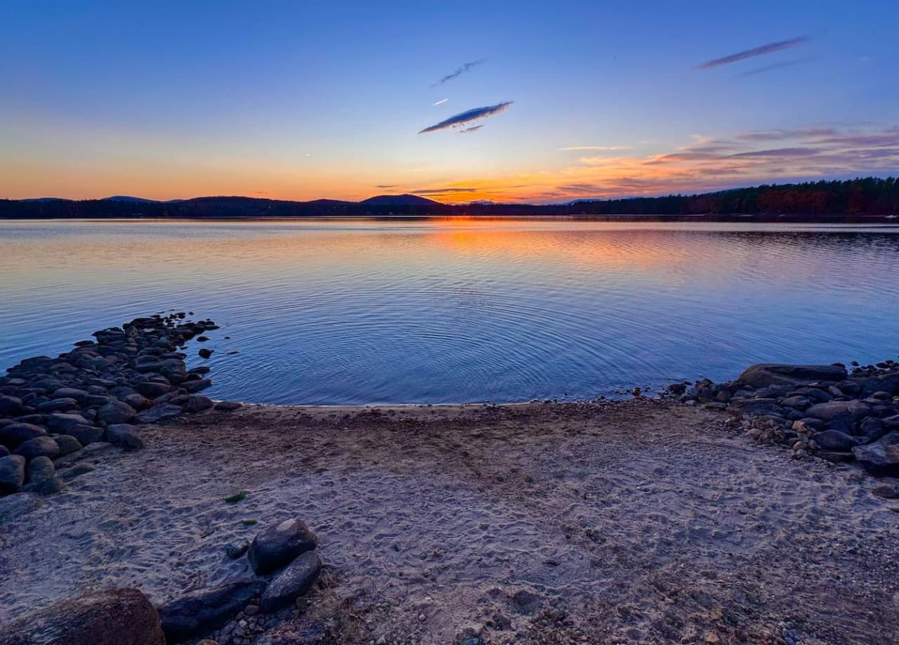 Your private sandy beach on Lovewell Pond