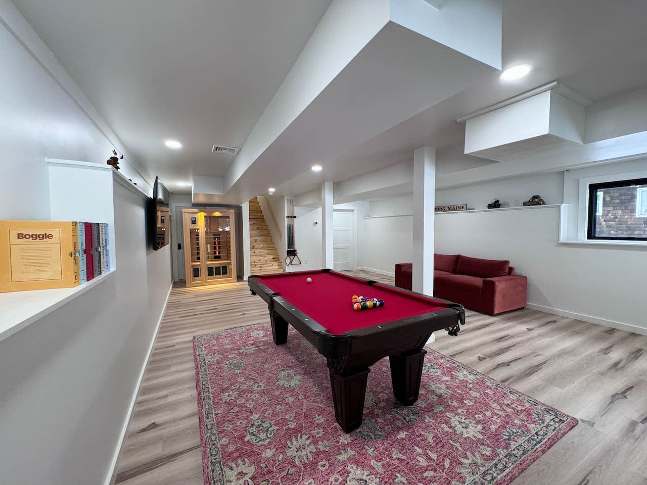 Brand new custom designed Brunswick Billiards table, Infrared Sauna, 65 inch TV, games and a queen pull out Joybird couch