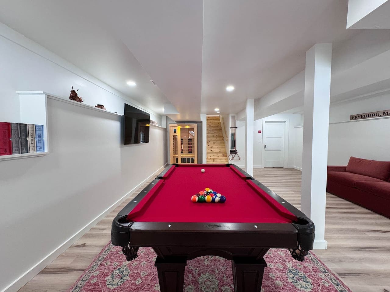 Brand new custom designed Brunswick Billiards table, Infrared Sauna, 65 inch TV, games and a queen pull out Joybird couch