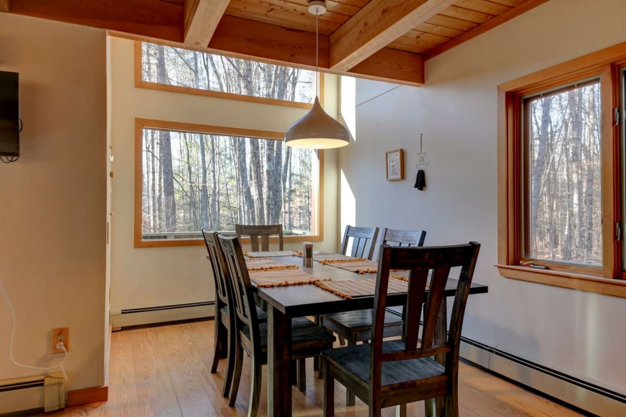 Framed by windows, the room makes you feel like you're in a tree house.