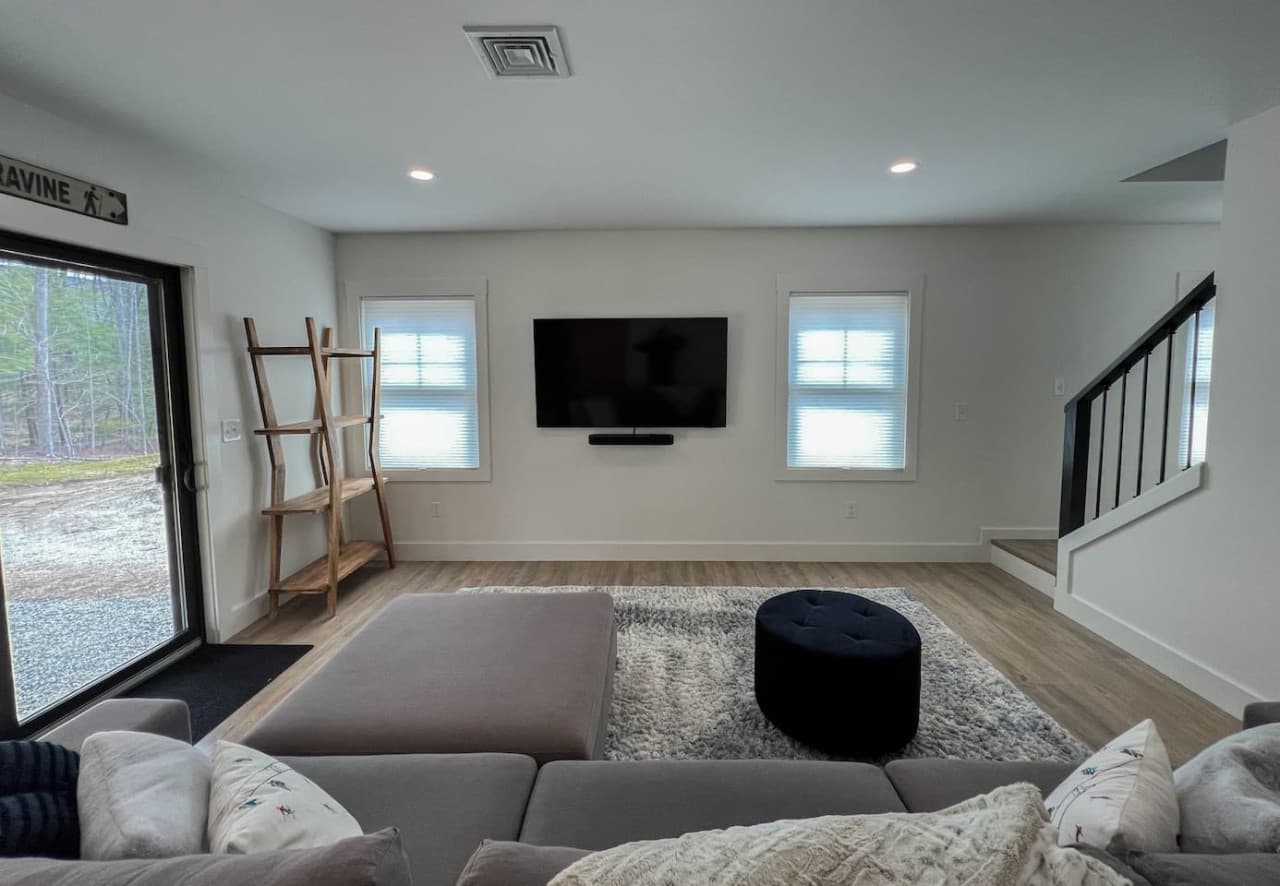 Second living room with flatscreen TV and quality sound bar