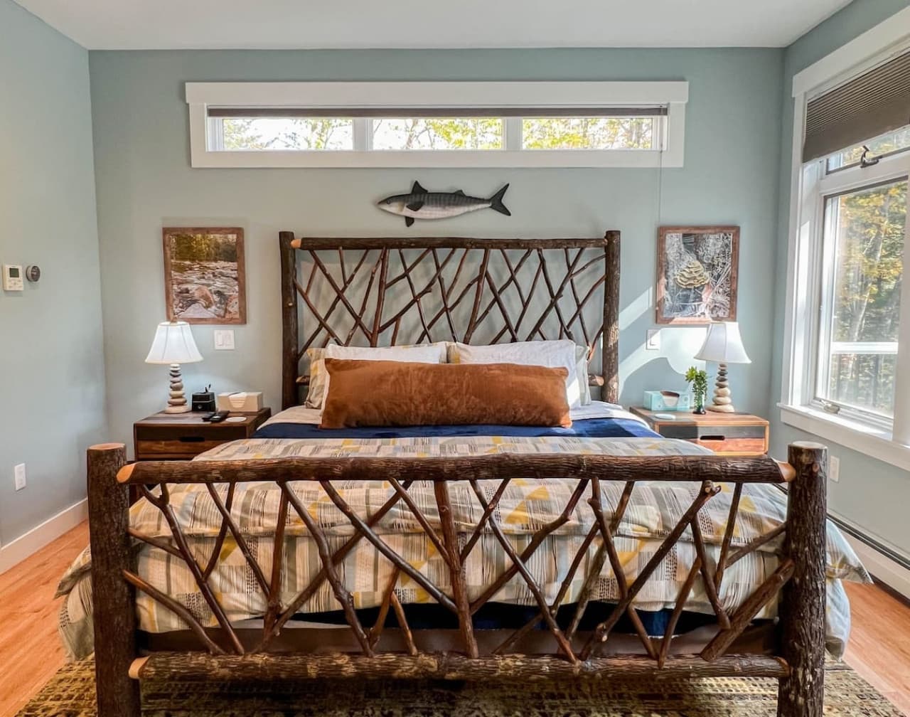 Spread out in the Master bedroom in the king-sized bed. On warm nights, open the windows and let the sounds of the flowing river lull you to sleep.