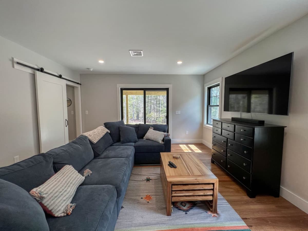 additional living room with Bose sound bar and flat-screen TV