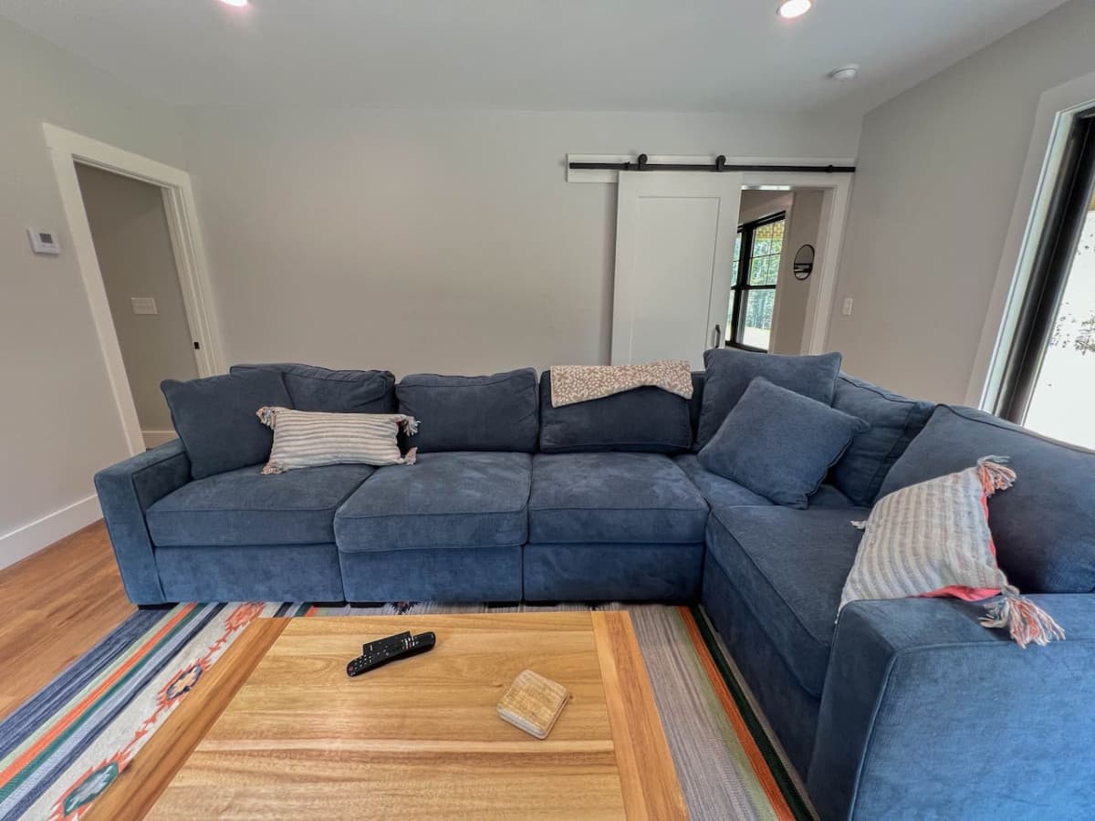 additional living room with Bose sound bar and flat-screen TV
