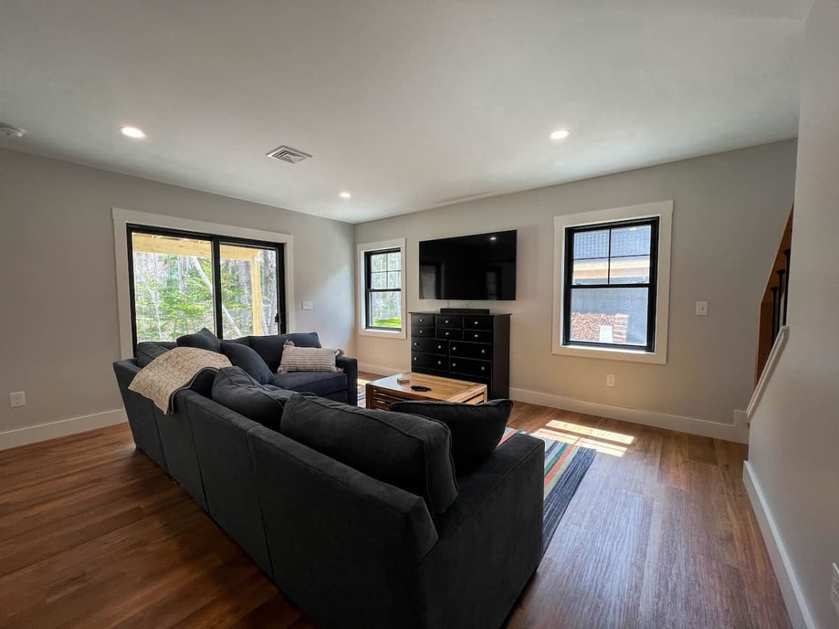 additional living room with Bose sound bar and flat-screen TV