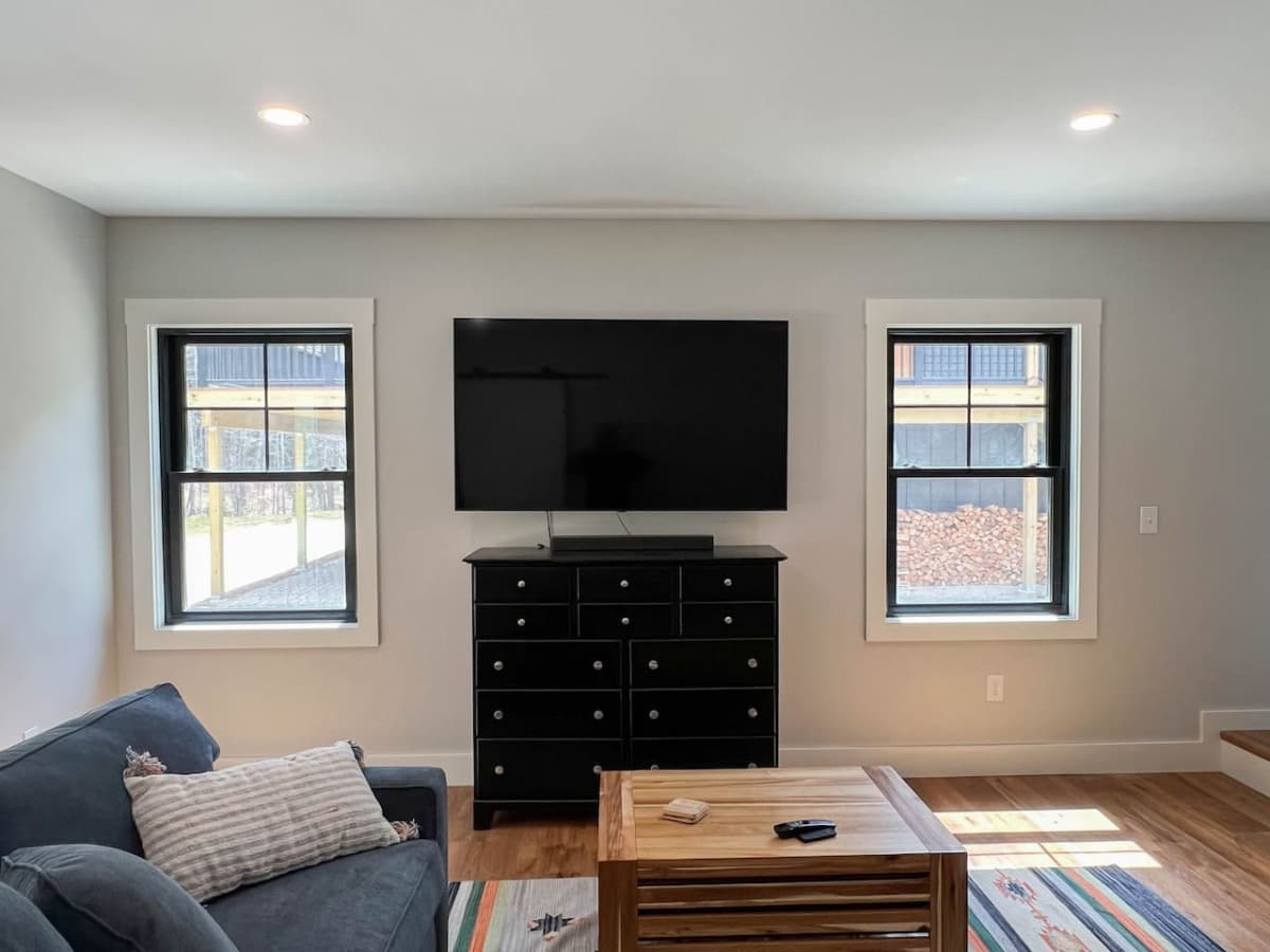 additional living room with Bose sound bar and flat-screen TV