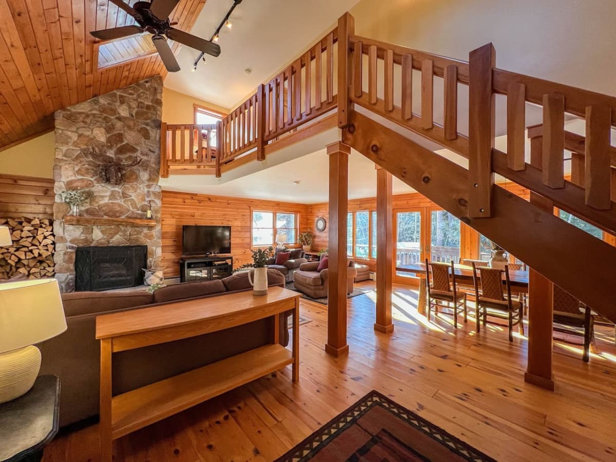 View from main entry way. Stairs lead to 1 of the master suites.