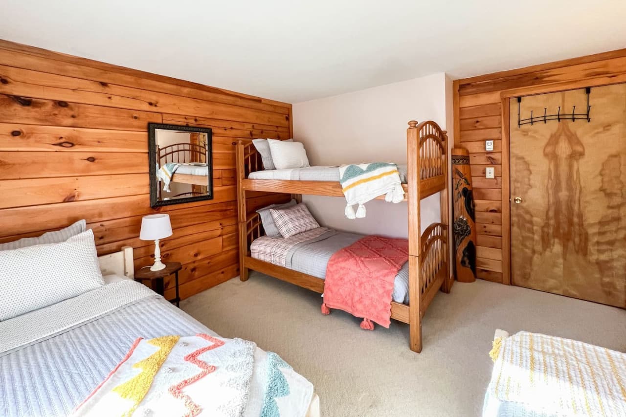 Perfect for kids, teenagers and adults alike - our "bunk room" has 4 twin beds, including a bunk bed. (Not pictured - ladder to get to the top bunk and a railings)