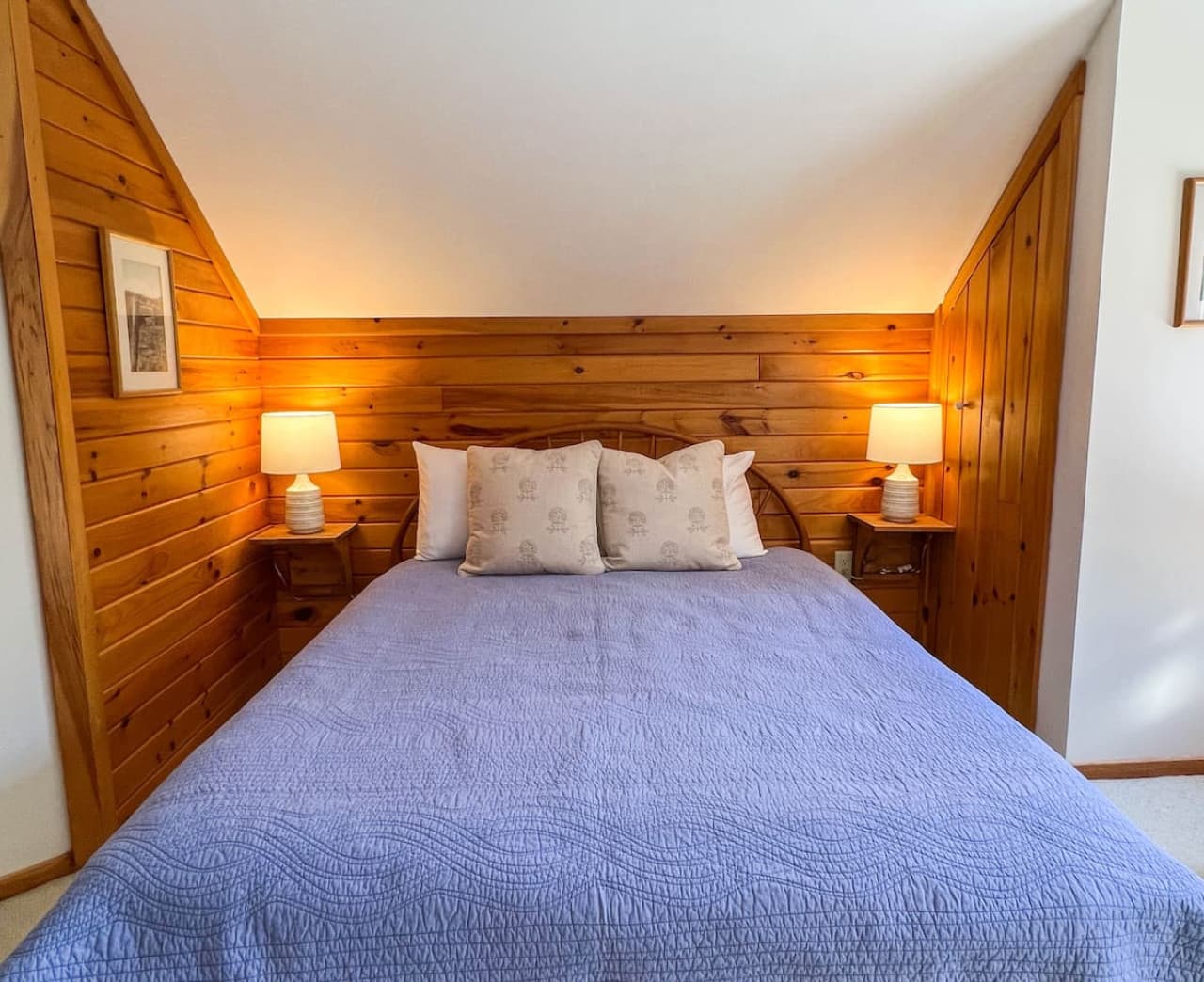 Fun Fact! These end tables were designed and built by one of the Owners who is a Master Carpenter. The end table next to the closet folds down, leaving space to access the closet if needed. Don't forget to move the lamp first of course!
