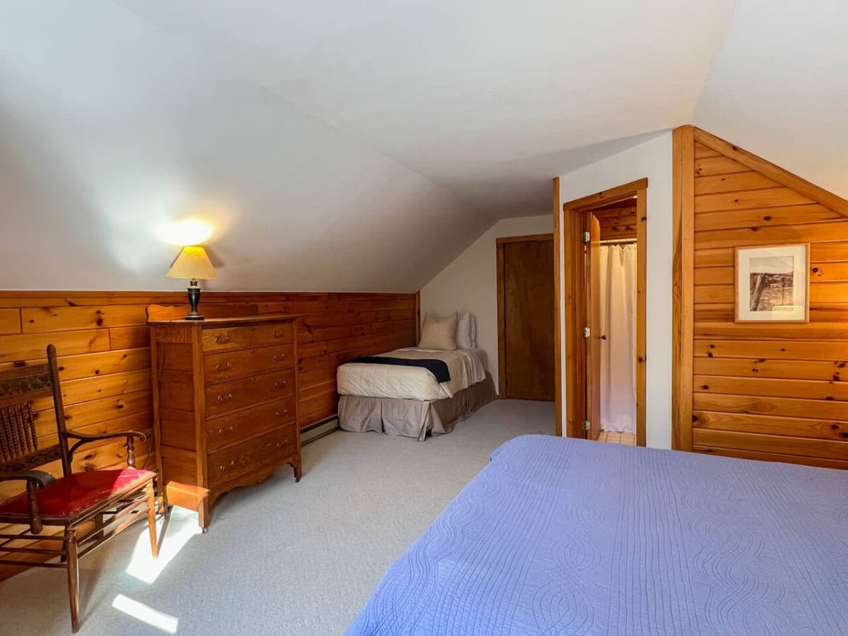 This spacious suite has a queen bed and a twin bed. It's perfect for a family with a younger child, not yet ready to be in the bunk room. There is also floor space for a pack and play. We provide 2.