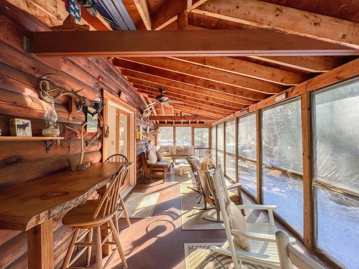This space is truly one of a kind. It's an outdoor spot that protects from those pesky mosquitos in the summer time and offers a bird's eye view of the backyard. Seen here are the winterized panels over the screens.