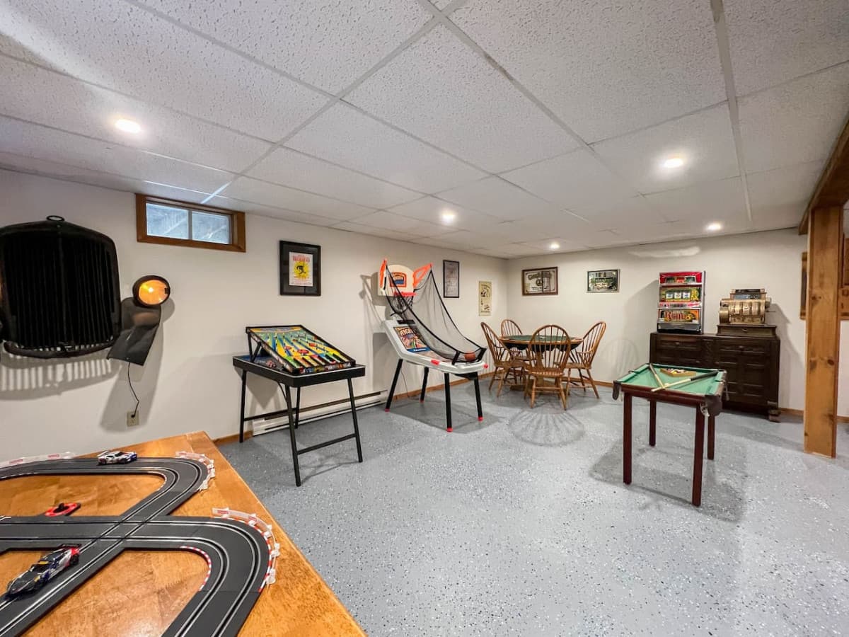Welcome to our newly renovated basement game room! With multiple sports tables, a poker table and slot car track, there's something for everyone.